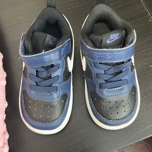 Toddler size 6 , NIKE shoes , blue black and white